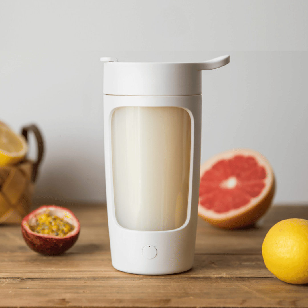 ShakeStorm electric mixer bottle demonstrating vortex mixing technology - portable protein shaker for gym and travel