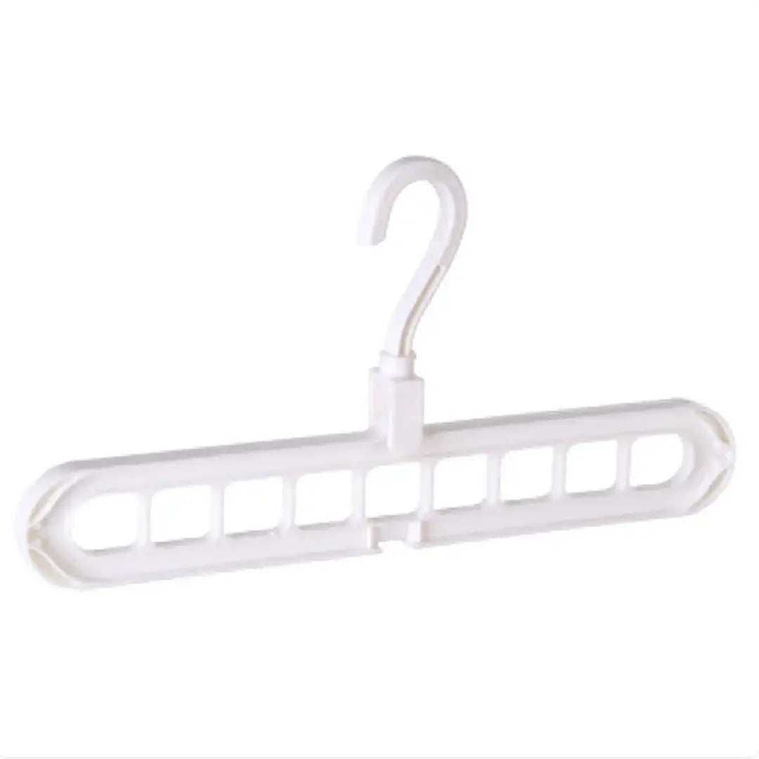 A set of multi-functional space-saving hangers arranged in a wardrobe, holding various garments.