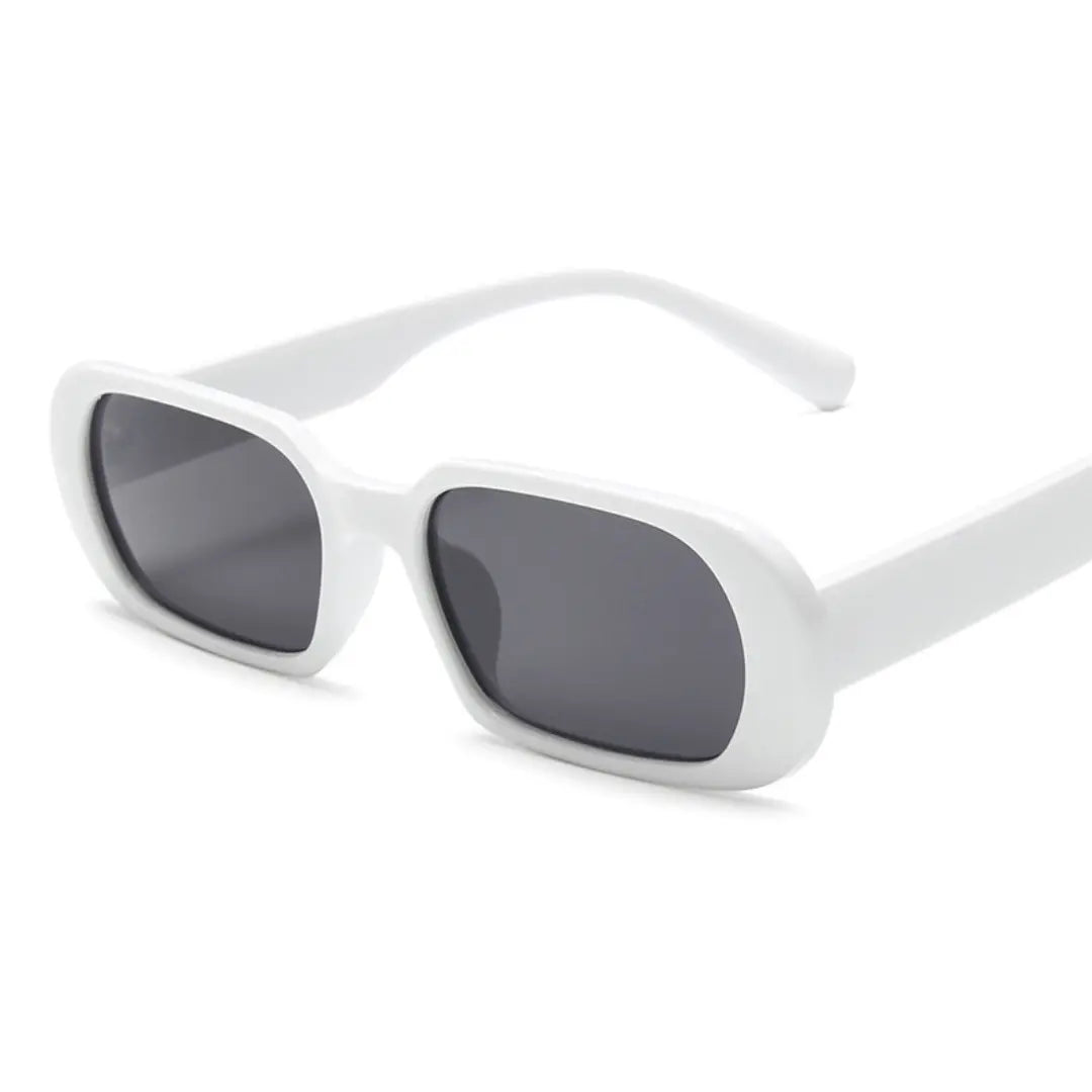 A pair of NoirVision black sunglasses with a minimalist design, displayed against a white background.