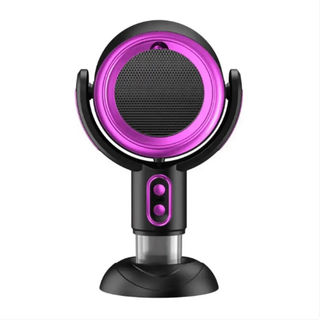 A compact and modern air purifier, the AirSphere Pro, with a black and orange color scheme, positioned on a wooden table beside citrus fruits, indicating its function of air purification.