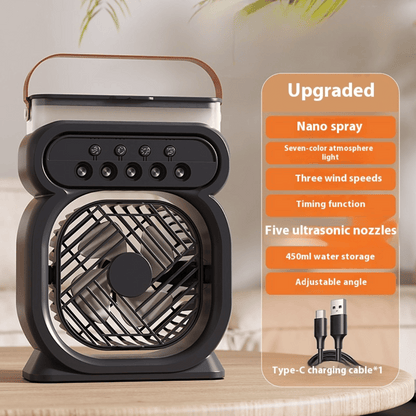 Black portable fan with features listed on an orange panel on a wooden surface.