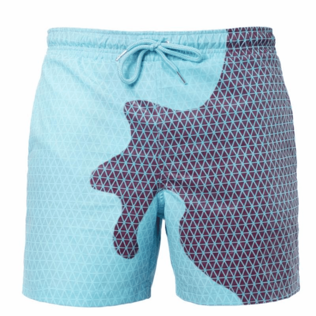 A collection of SplashShift Shorts in various colors, featuring a man modeling the yellow pair, with other pairs shown in blue, orange, and green splattered patterns.