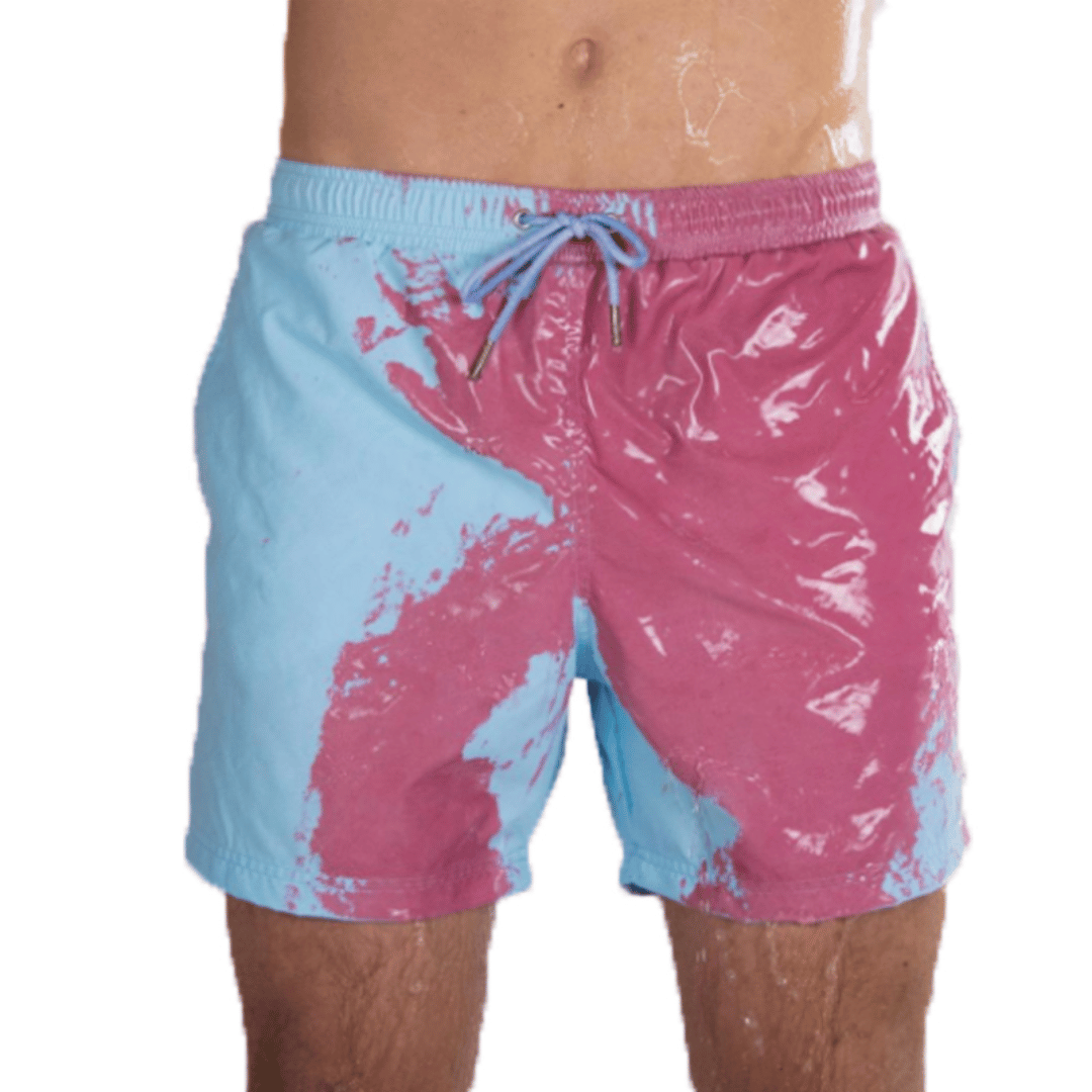 A collection of SplashShift Shorts in various colors, featuring a man modeling the yellow pair, with other pairs shown in blue, orange, and green splattered patterns.