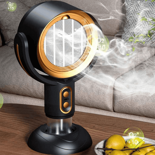 A compact and modern air purifier, the AirSphere Pro, with a black and orange color scheme, positioned on a wooden table beside citrus fruits, indicating its function of air purification.