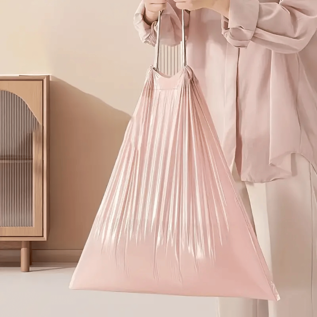 DormEase pink decorative trash bags adding stylish color to dorm room waste management