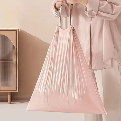 DormEase pink decorative trash bags adding stylish color to dorm room waste management