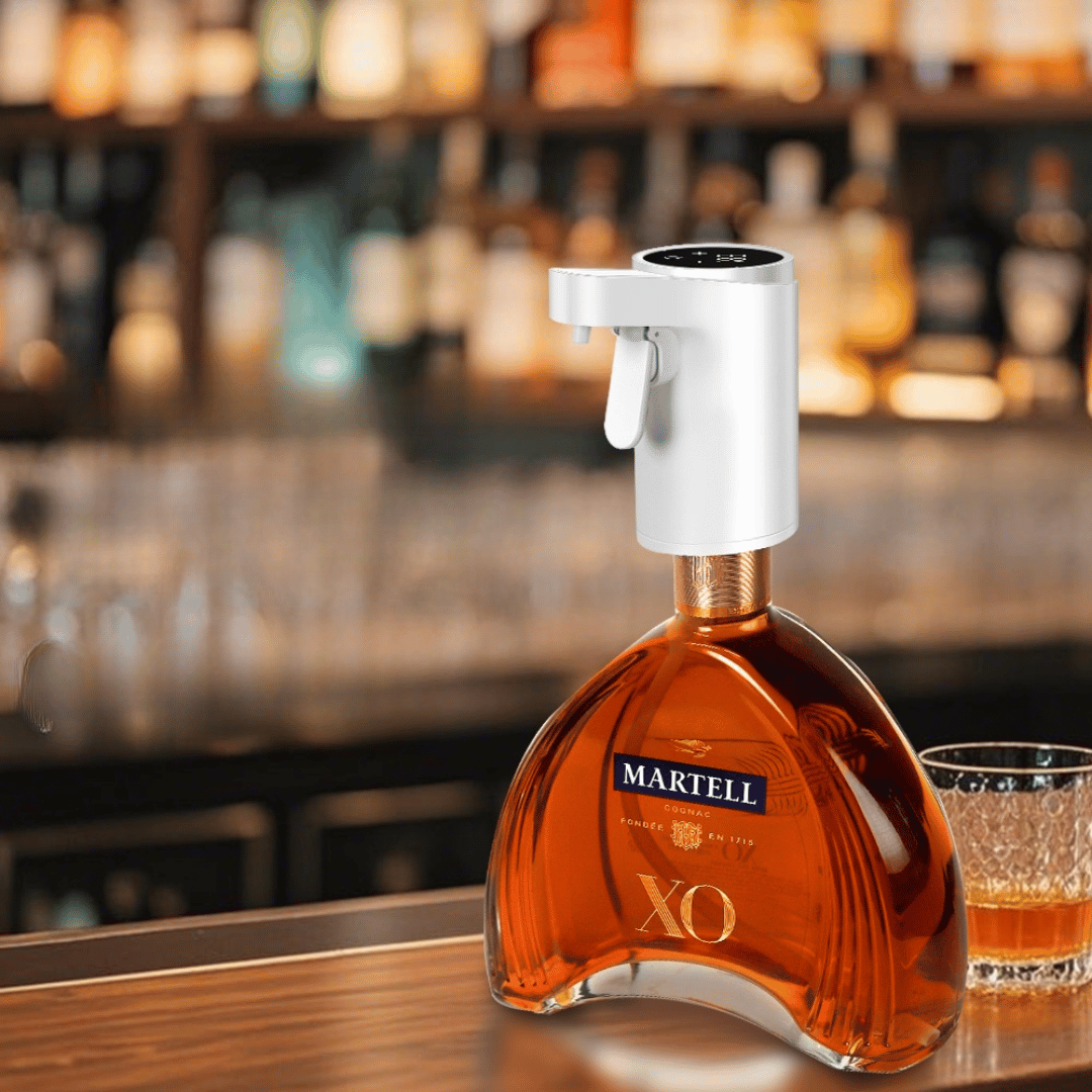 Martell XO cognac bottle with a glass on a bar counter, blurred bar background