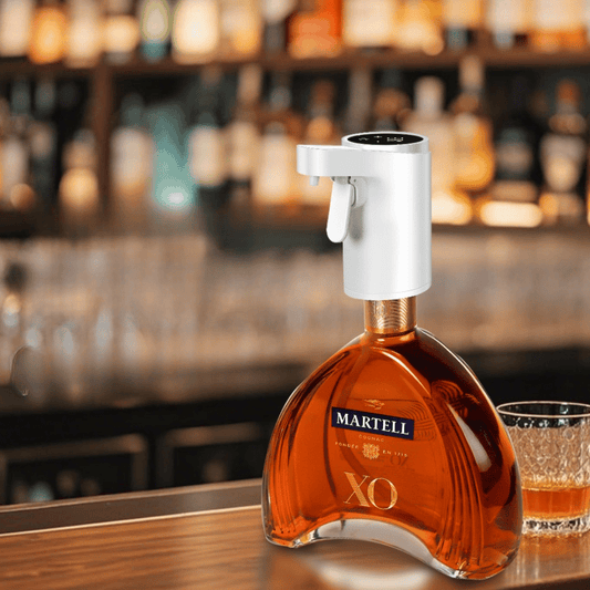 Martell XO cognac bottle with a glass on a bar counter, blurred bar background