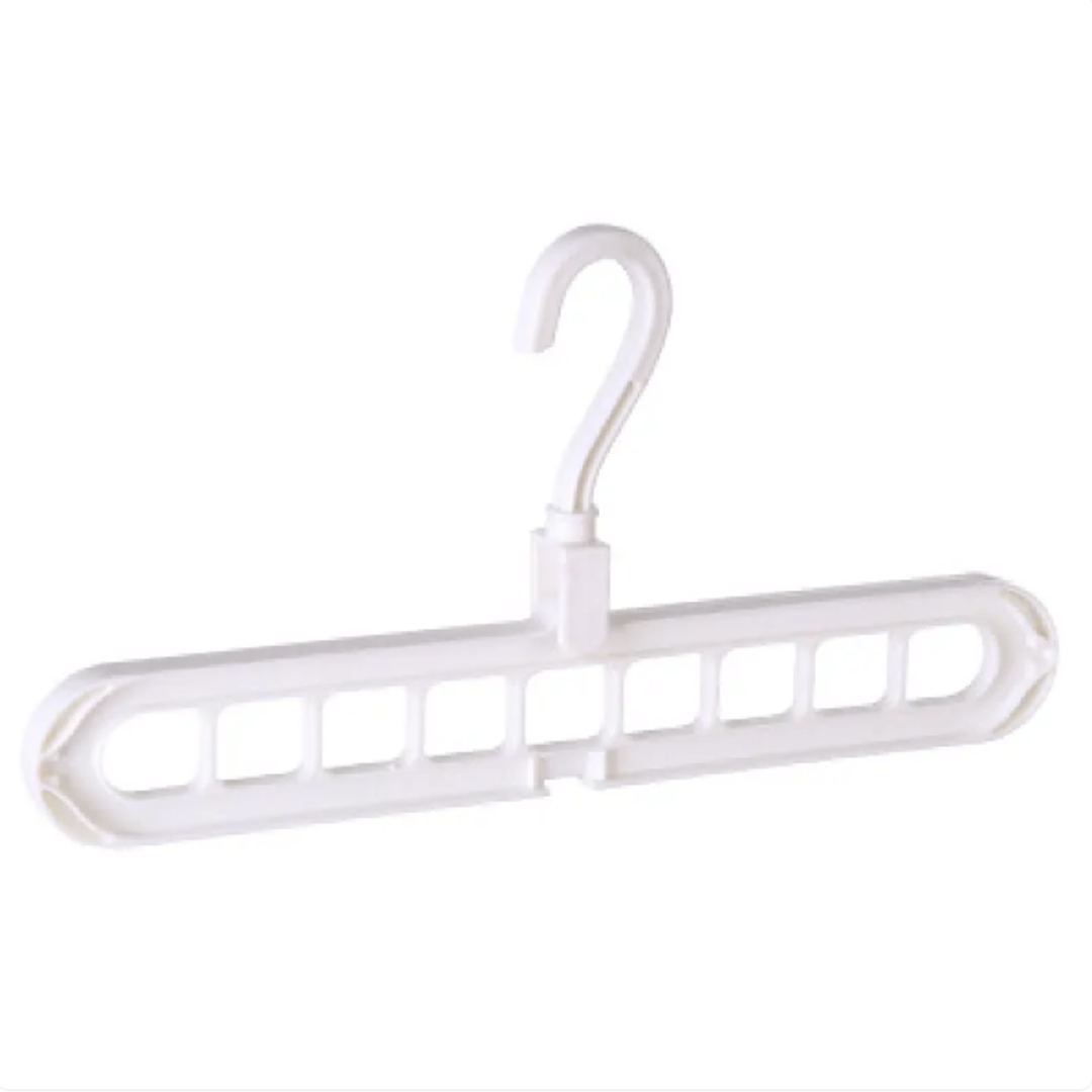 A set of multi-functional space-saving hangers arranged in a wardrobe, holding various garments.