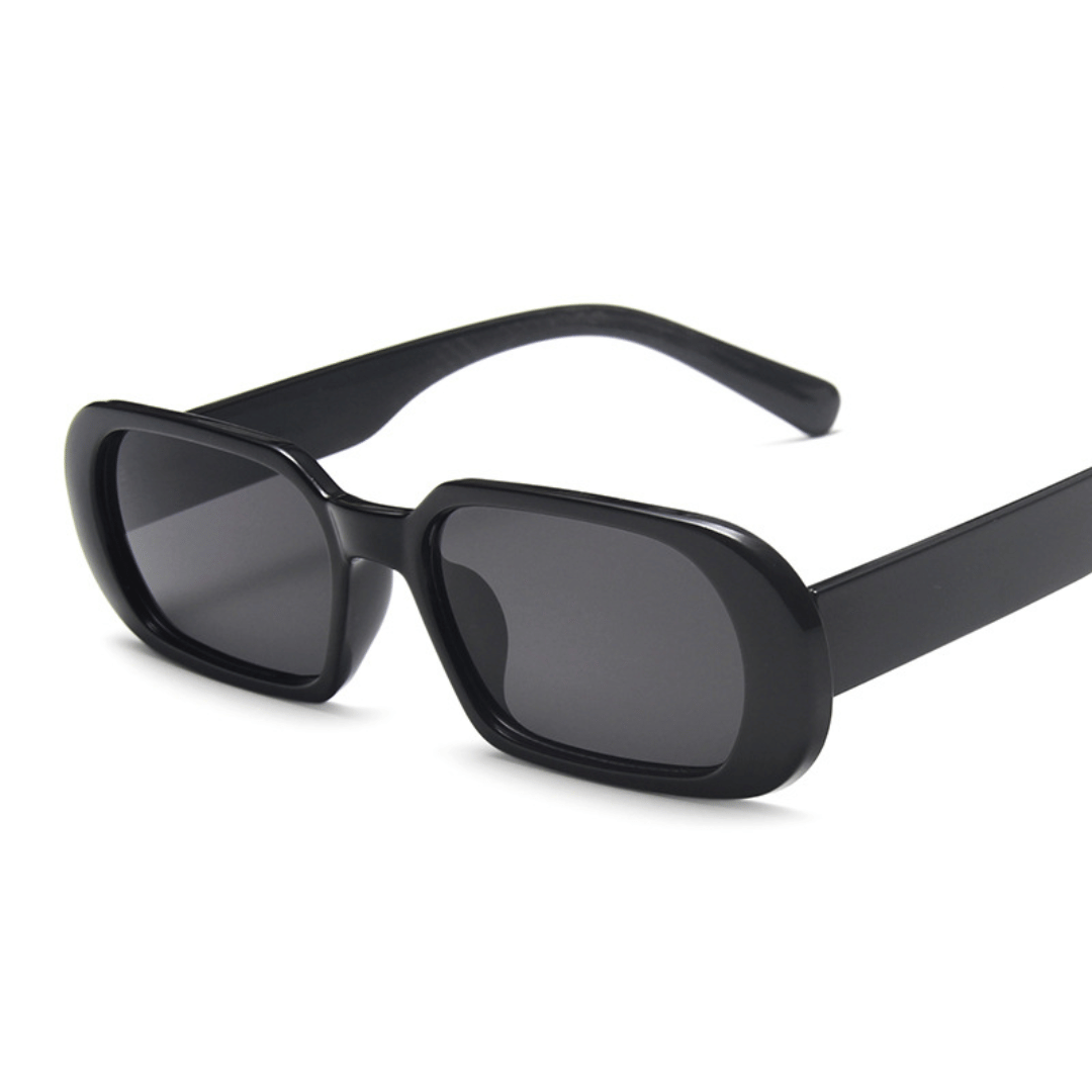 A pair of NoirVision black sunglasses with a minimalist design, displayed against a white background.