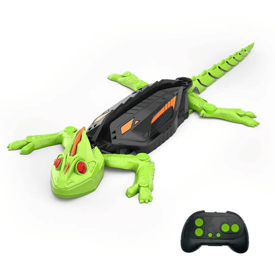Toy lizard with a remote control on a white background