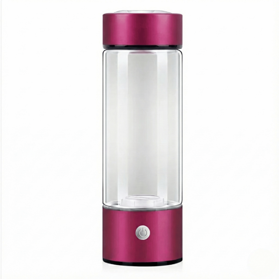 Clear glass bottle with a pink metallic top and base on a white background