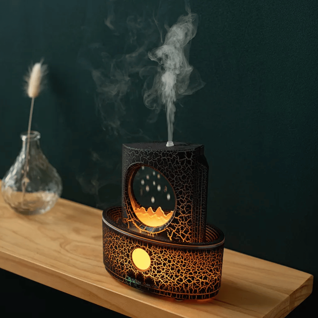 Decorative diffuser with moon and star design on a wooden surface