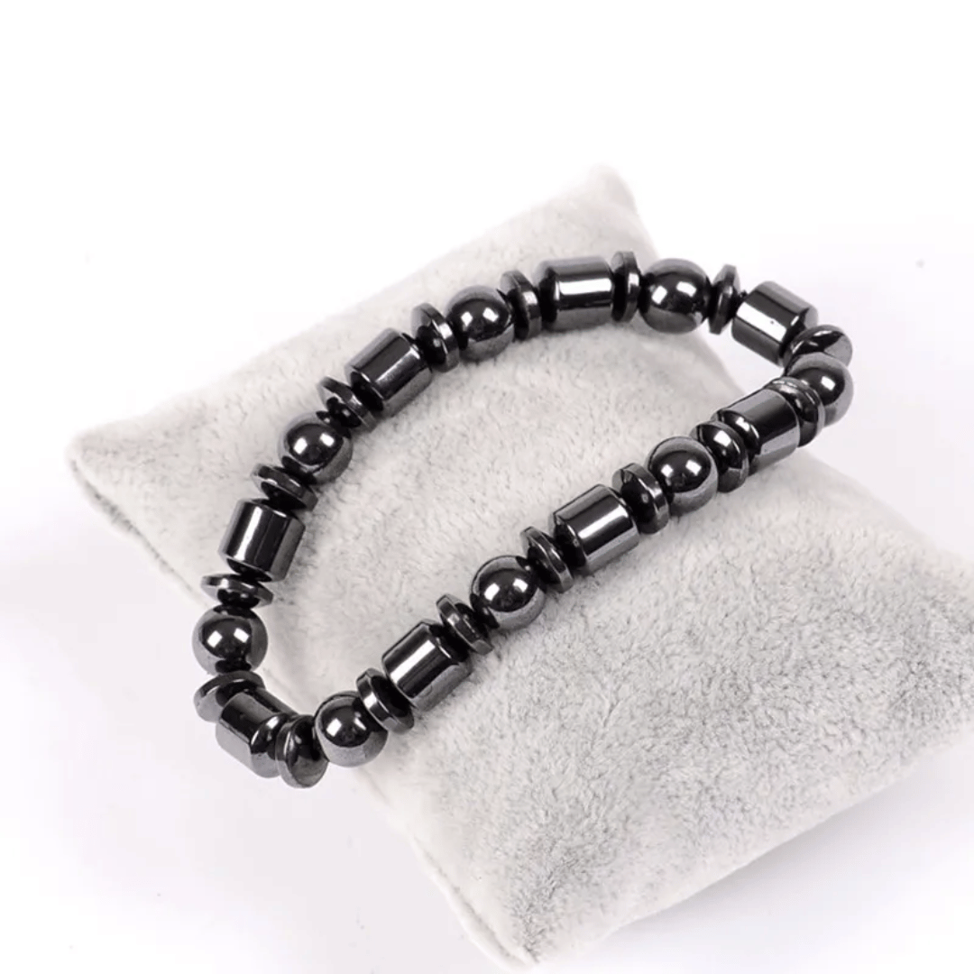 Close-up view of MetaBand hematite stone magnetic bracelet showing premium black stones and sleek design