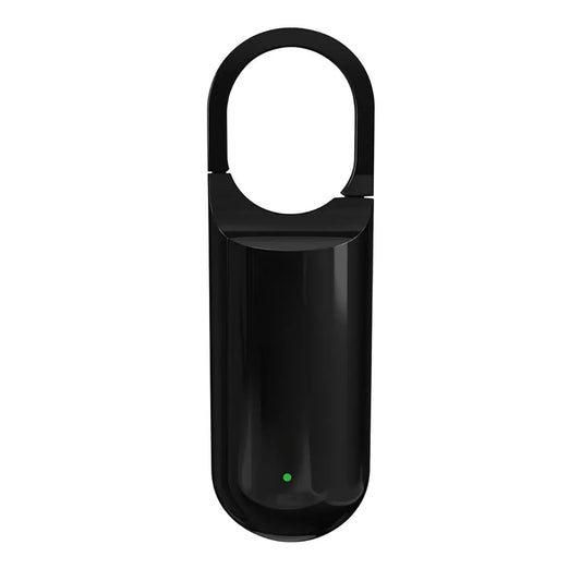 Black electronic device with a green light on a white background