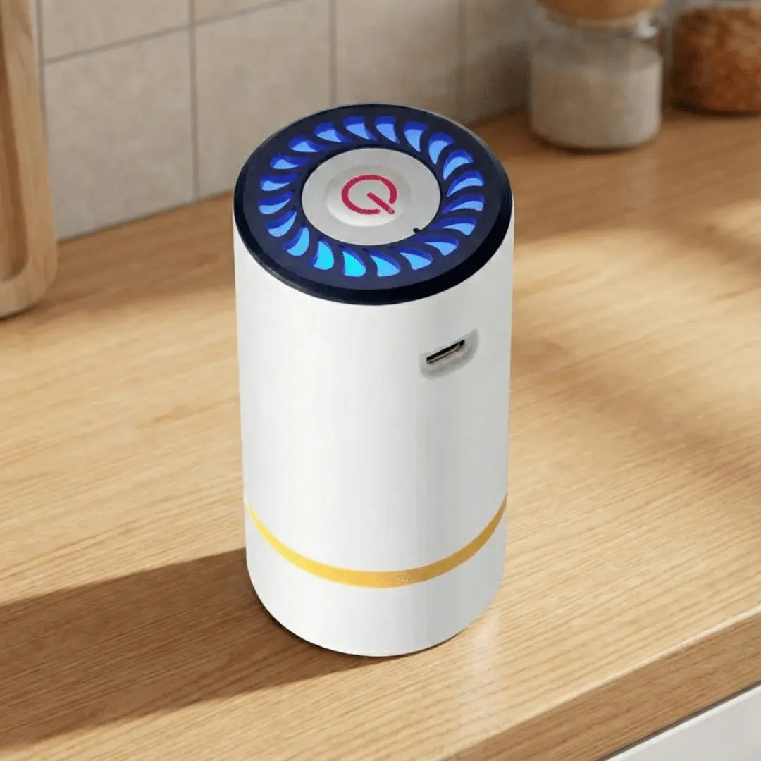 White electronic device with blue and red lights on a wooden surface
