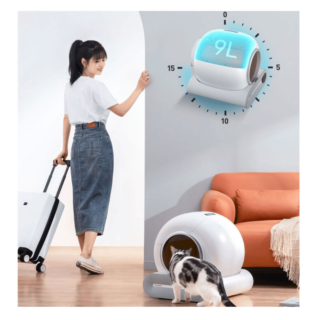 IntelliPurr litter box internal mechanism showing automatic cleaning system and waste collection tray