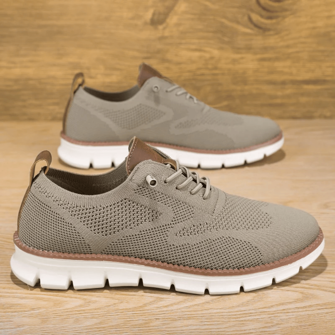 A pair of black Hugo Ultra Comforatable Shoes with a lace-up closure, featuring a breathable knit upper, a removable honeycomb foam footbed, and a high-density TPU sole.