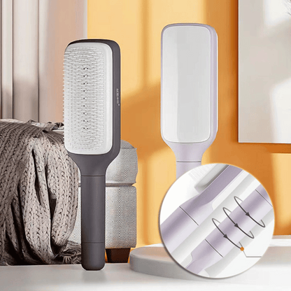 Close-up view of SilkyCare hairbrush bristles showing self-cleaning mechanism