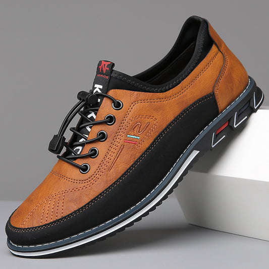 A pair of Oxford Comfort Sneakers featuring a brown upper with black accents and a white sole.