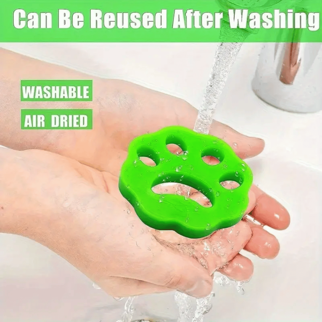 Green paw-shaped scrubber being used in hands with water, text indicating it can be reused after washing.