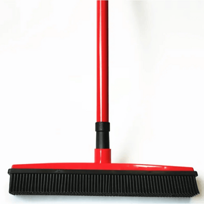 Red and black broom on a white background