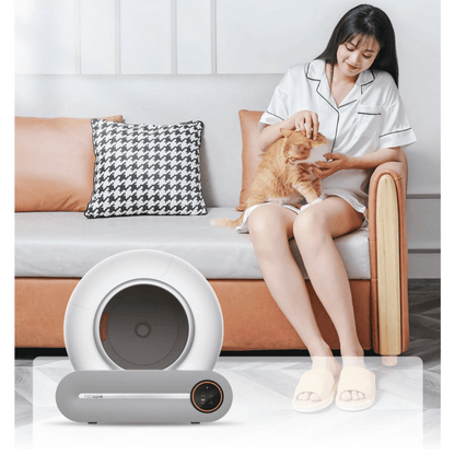 IntelliPurr litter box internal mechanism showing automatic cleaning system and waste collection tray