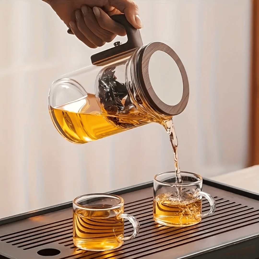 ZenFlow Glass Teapot side angle displaying magnetic stainless steel tea infuser system