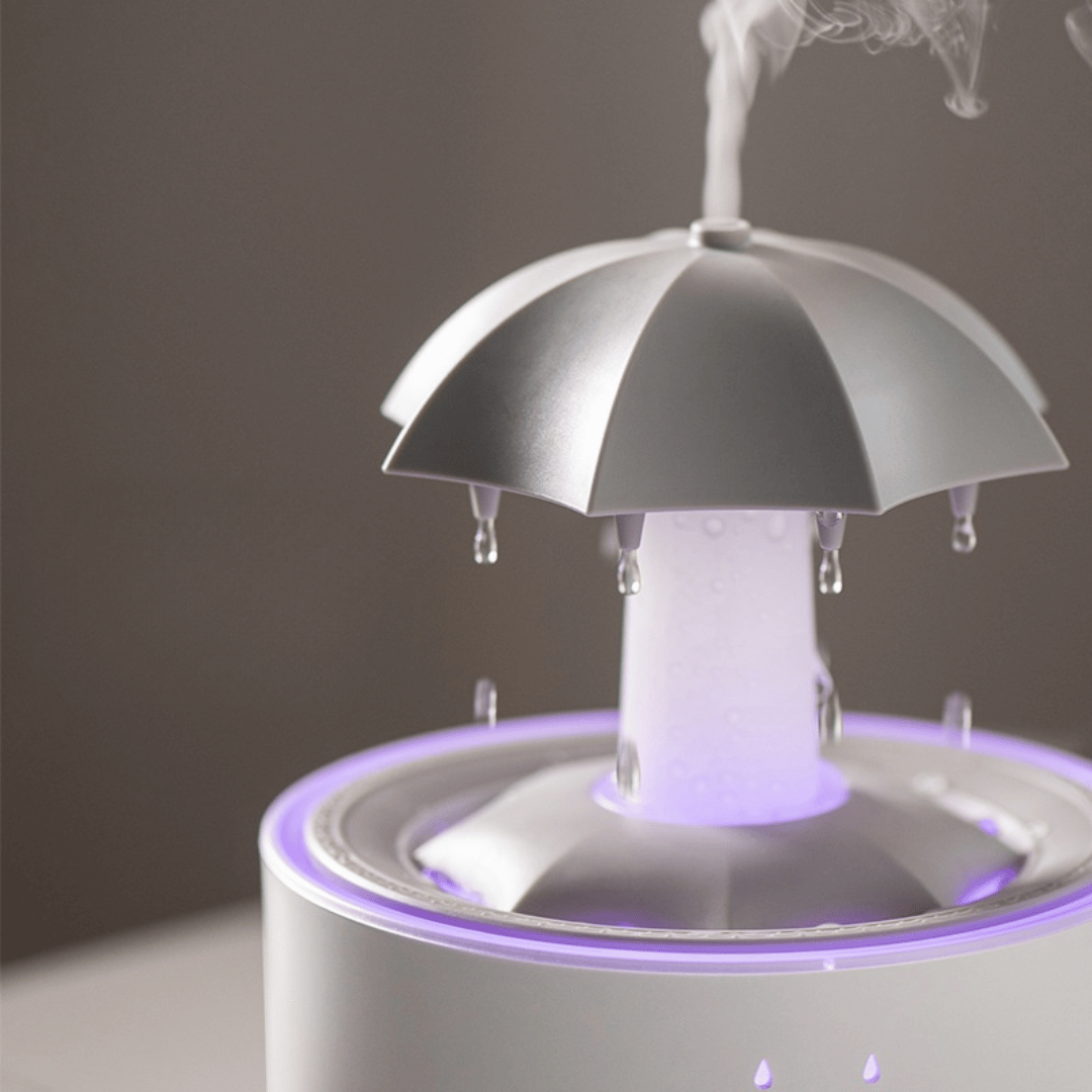 Umbrella-shaped humidifier emitting mist with a dark background