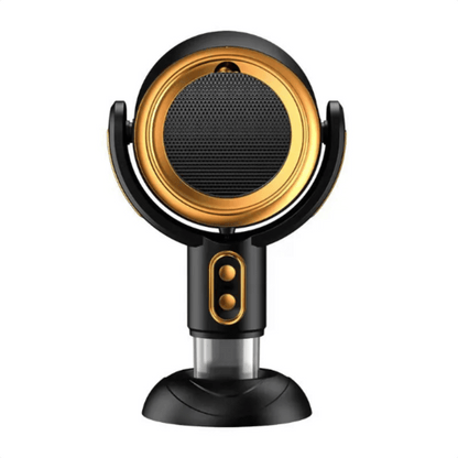 A compact and modern air purifier, the AirSphere Pro, with a black and orange color scheme, positioned on a wooden table beside citrus fruits, indicating its function of air purification.