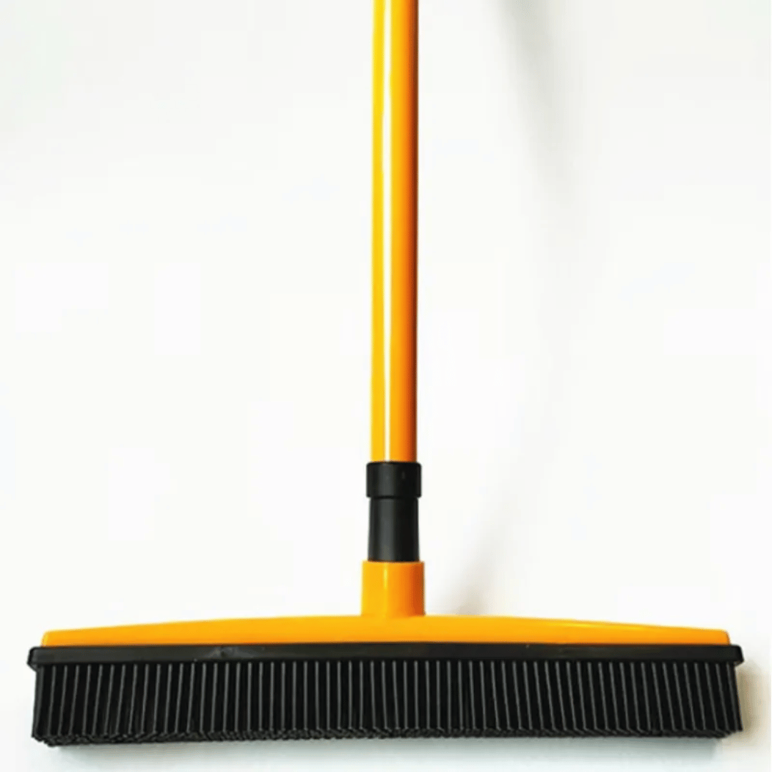 Yellow and black broom on a white background