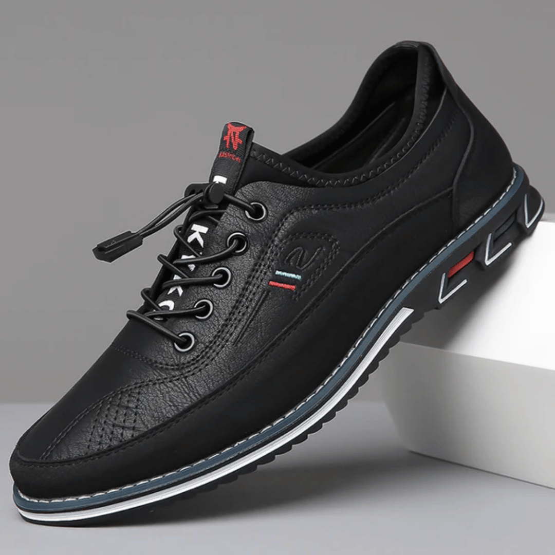 A pair of Oxford Comfort Sneakers featuring a brown upper with black accents and a white sole.