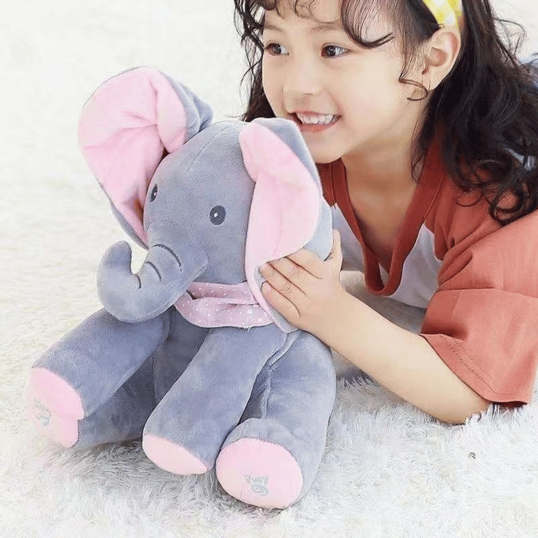 Animated elephant plush toy - close-up of moving ears and interactive singing mechanism