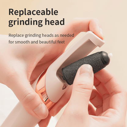 Foot care device with replaceable grinding head held by a hand on a beige background