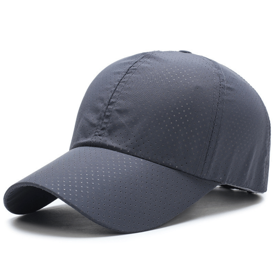 Gray baseball cap with ventilation holes on a white background