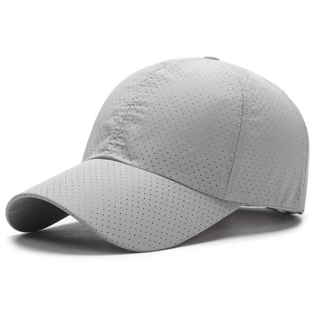 Gray baseball cap with perforated design on a white background