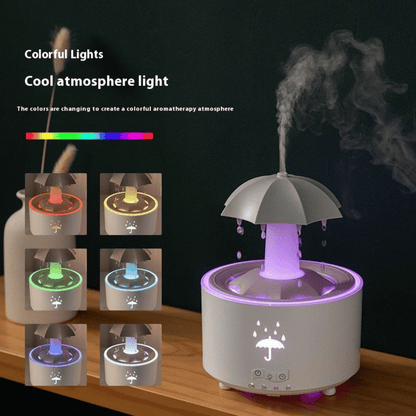 Umbrella-shaped humidifier with colorful lights on a wooden surface