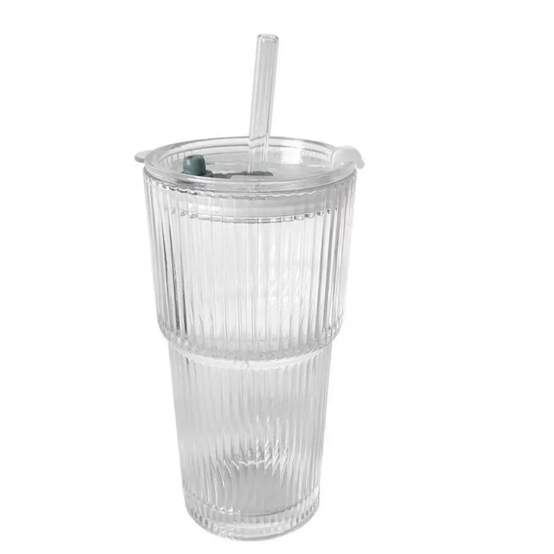 Clear tumbler with a textured design on a white background