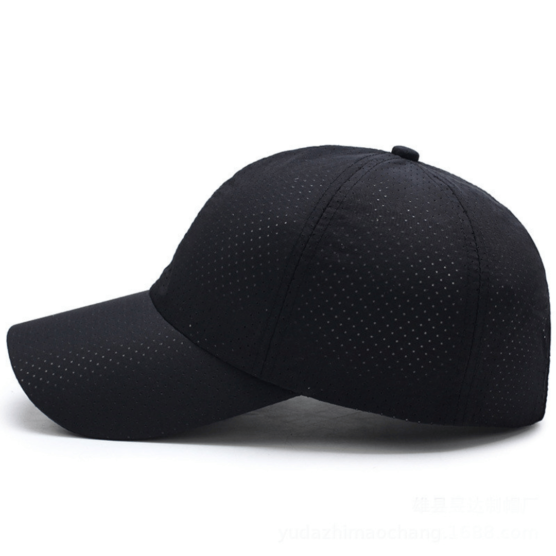 Black baseball cap with perforated design on a white background