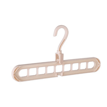 A set of multi-functional space-saving hangers arranged in a wardrobe, holding various garments.