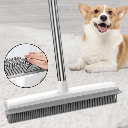 Pet grooming brush with close-up of bristles and a happy dog lying on a carpet.