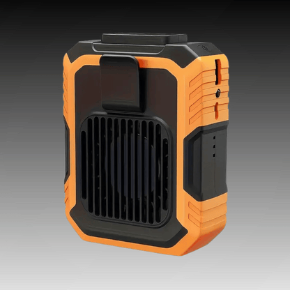 A portable orange and black fan attached to a belt, with a person's pants in the background.