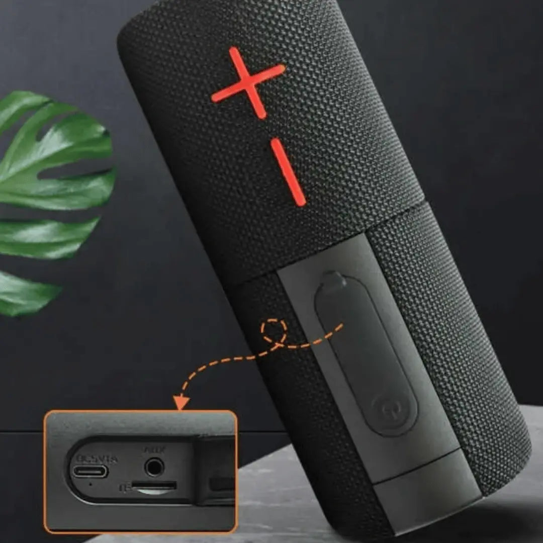 Black textured electronic device with red 'X' and '1' symbols, and USB-C port inset on a dark background.